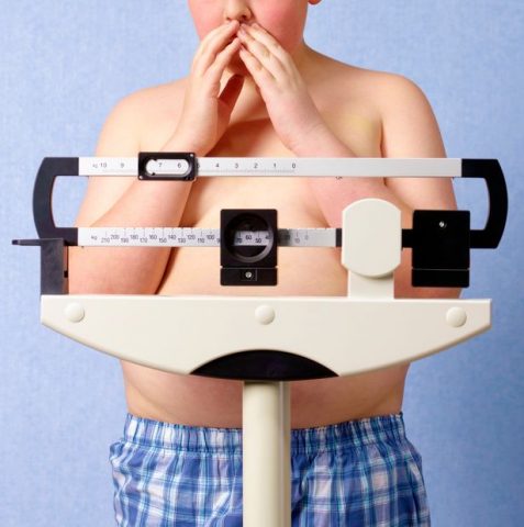 PROD-12-year-old-obese-boy-weighing-himself