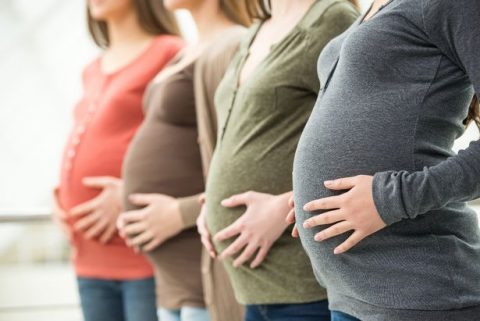 PROD-Pregnant-women-lined-up-in-a-row