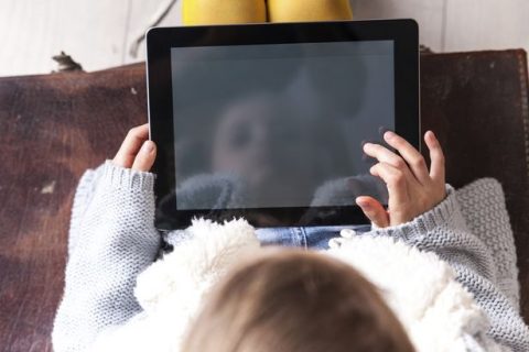 Child-using-a-tablet-computer